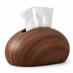 Smooth, rounded dark brown wooden tissue box with a visible wood grain, featuring white tissues emerging from a top slot.