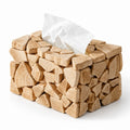 Rectangular box with a mosaic of natural, irregular wooden pieces, a white tissue emerging from its top opening.