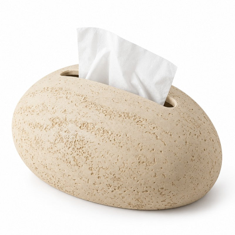 Light beige, pebble-shaped tissue box with a textured surface, showcasing a white tissue emerging from the top slot.